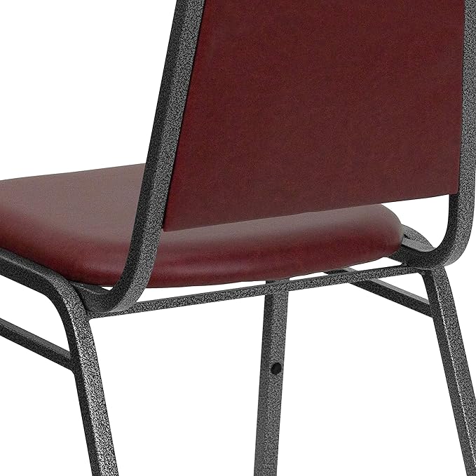 EMMA + OLIVER Trapezoidal Back Vinyl Stackable Banquet Chair, Multipurpose Stacking Chair with Padded Seat and Back, Burgundy/Silver